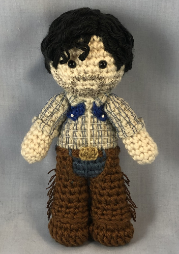 Crocheted doll amigurumi Curly McClain from Oklahoma!