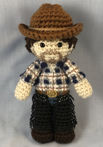 Crocheted doll amigurumi Will Parker from Oklahoma!
